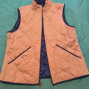 Tan vest, blue inner lines, never worn